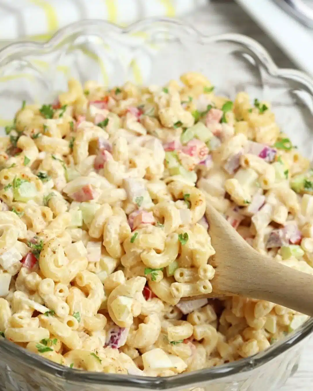 Delicious cold pasta salad with vegetables and dressing