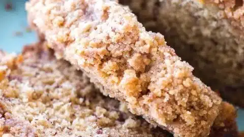 Delicious Coffee Cake Banana Bread sliced on a wooden board