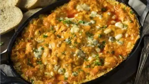 Delicious Easy Buffalo Chicken Dip served with tortilla chips
