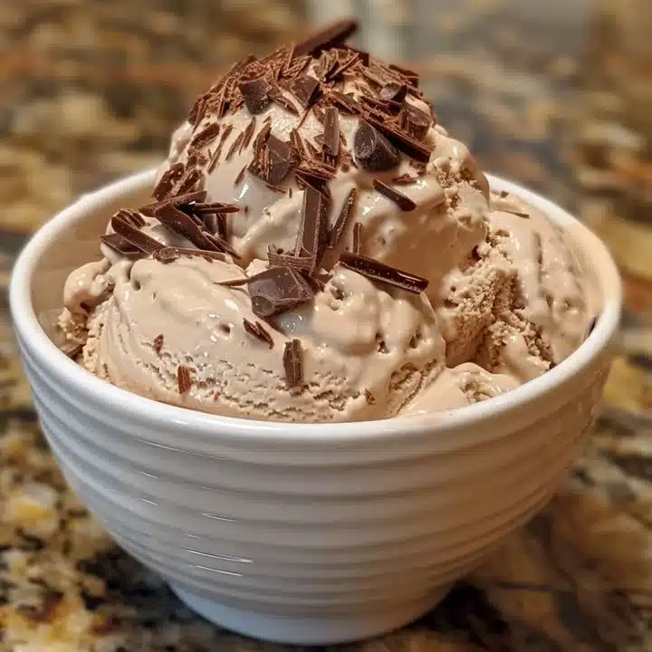 Delicious homemade Baileys ice cream served in a bowl with chocolate shavings