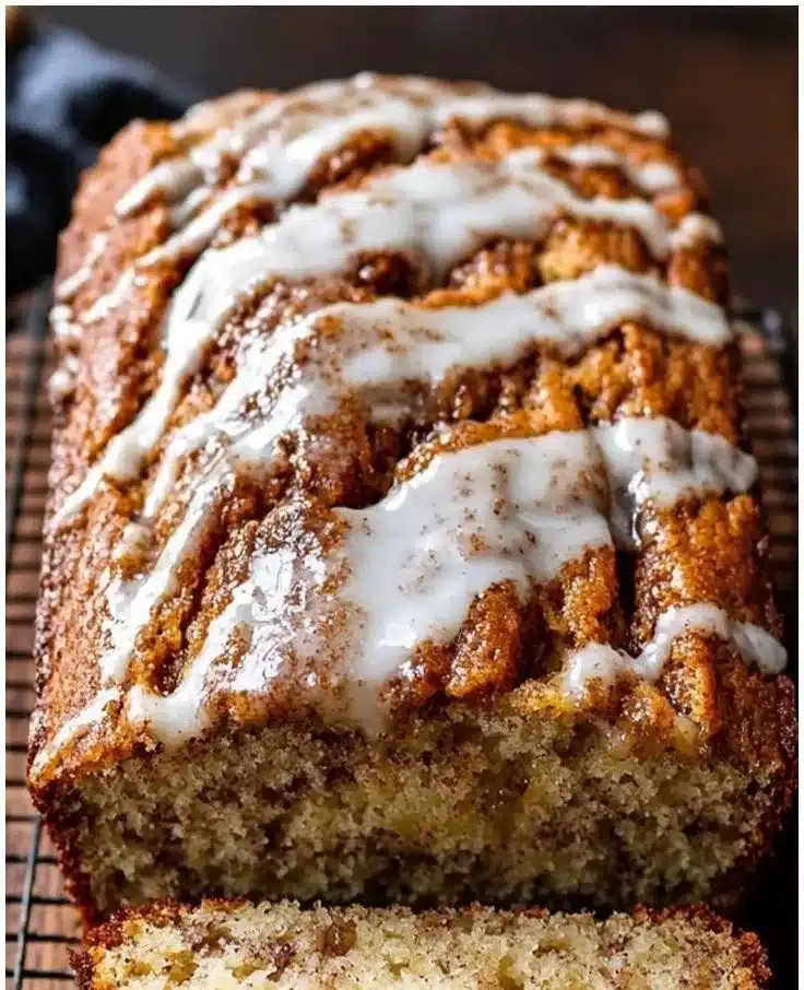 loaf of homemade cinnamon swirl banana bread with a golden top
