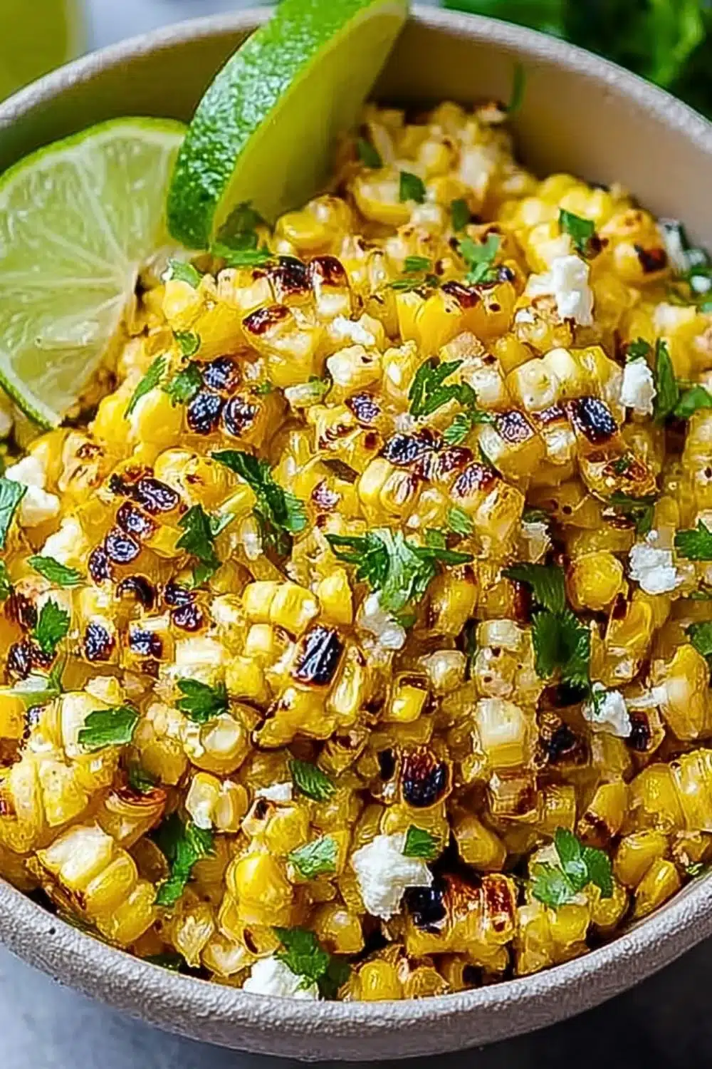 Bowl of vibrant Mexican street corn salad with fresh ingredients and flavors