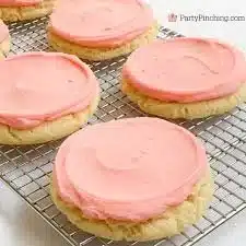 Delicious Crumbl Pink Sugar Cookie topped with vibrant pink icing