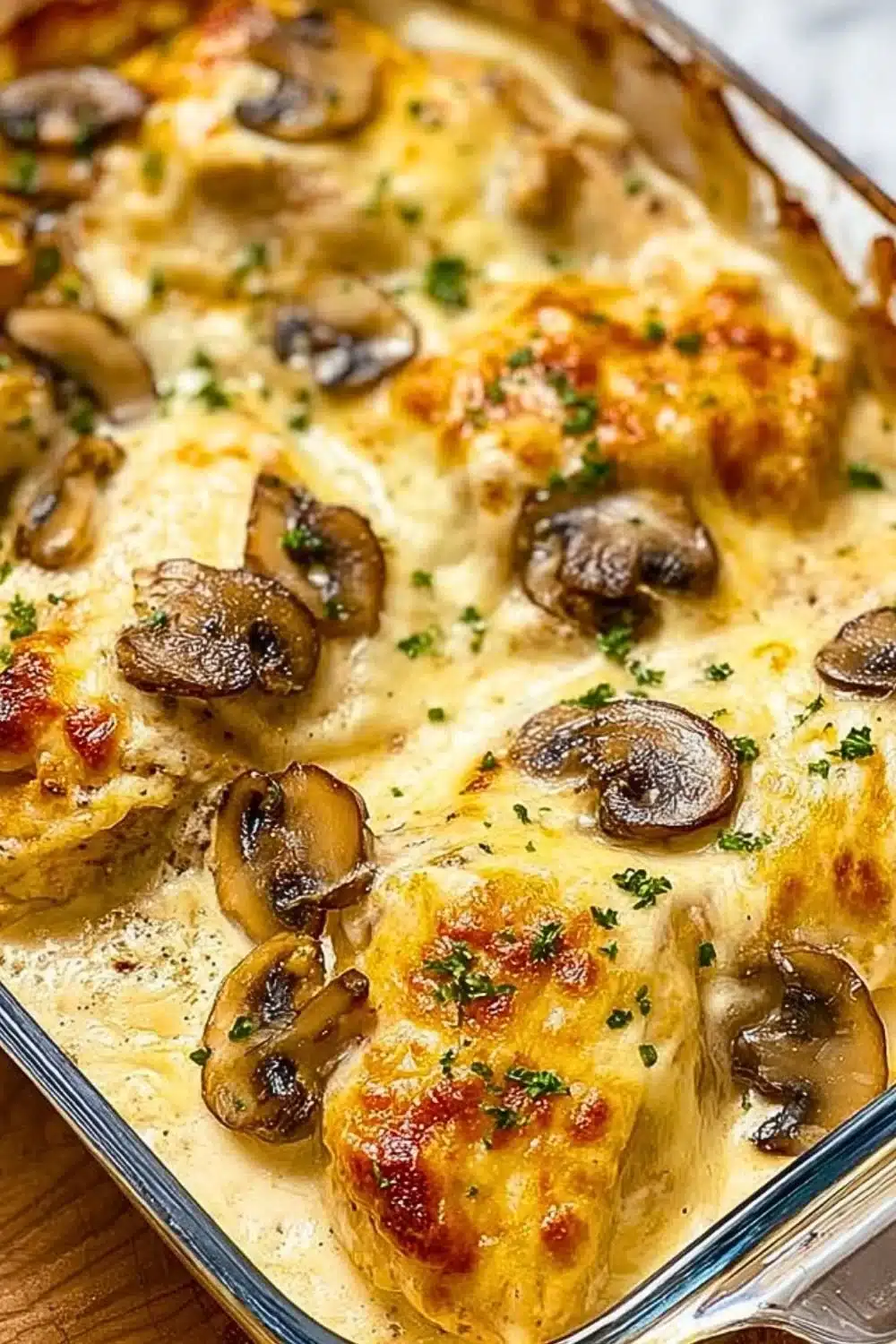 A hearty Chicken Mushroom Bake with succulent chicken and creamy mushroom sauce