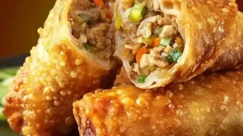 Plate of classic pork egg rolls ready to be enjoyed