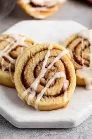 No-bake cinnamon roll cookies arranged on a plate