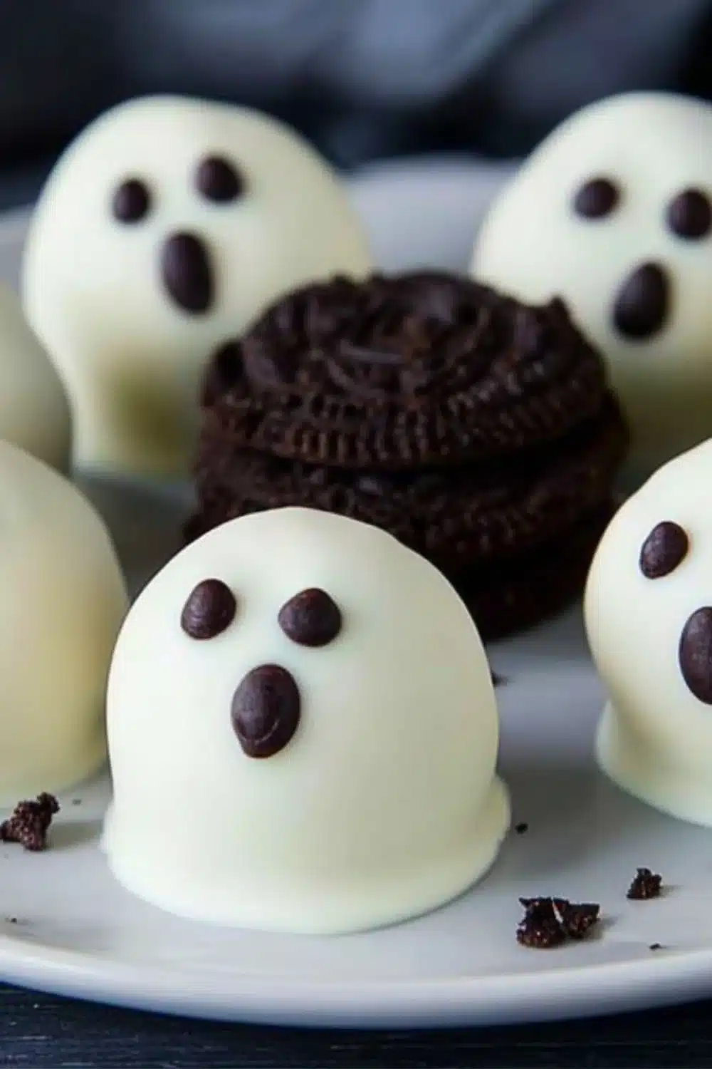 No-Bake Oreo Ghost Truffles decorated for Halloween