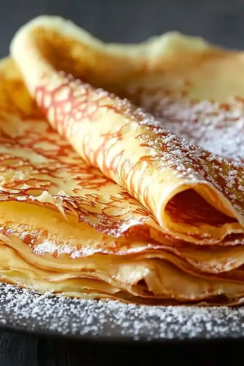 Delicious homemade crepes served with fresh fruit and whipped cream