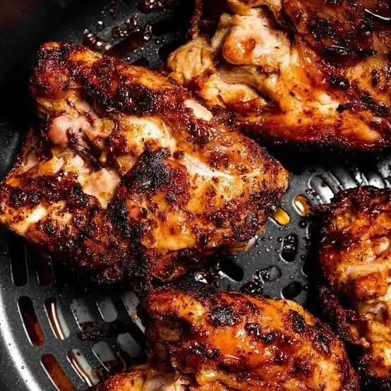 Delicious air fryer chicken served with garnishes and sides