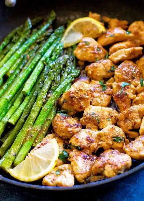 Delicious Garlic Butter Chicken served with herbs and spices