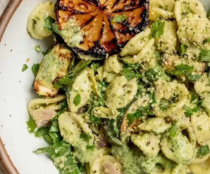 Plate of fresh Lemon Basil Pasta garnished with basil leaves and lemon zest