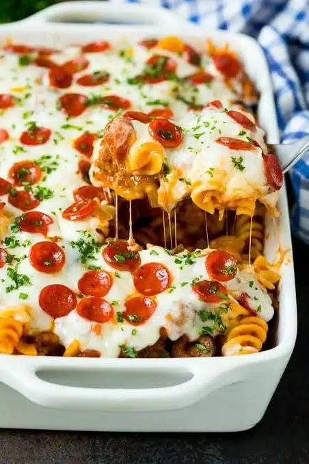 Delicious low carb pizza casserole garnished with fresh herbs