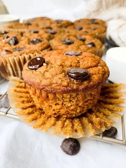 Delicious homemade Pumpkin Protein Muffins on a wooden table