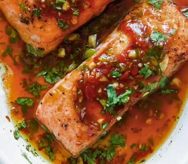 Delicious sweet chilli salmon served with vegetables on a plate